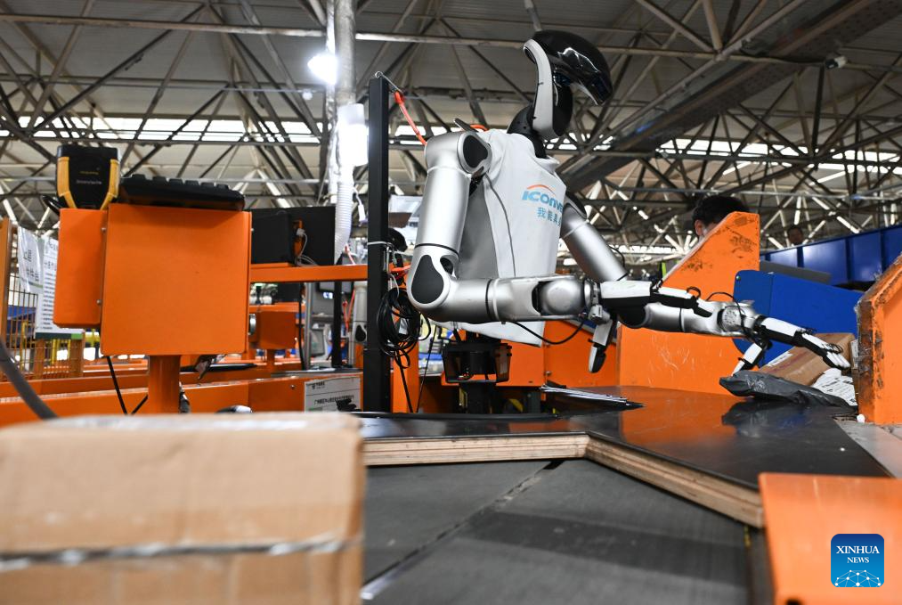 Automated sorting equipment handles parcels in Guangzhou, China’s Guangdong