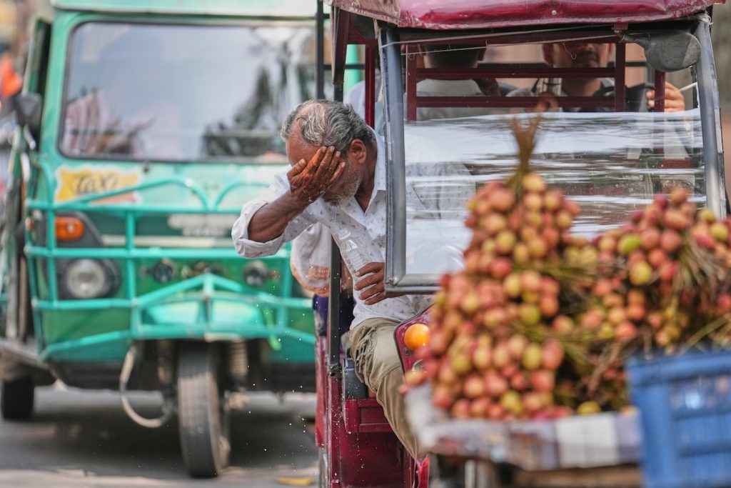 India sweltering under heat waves, with temperatures rising above 46 C