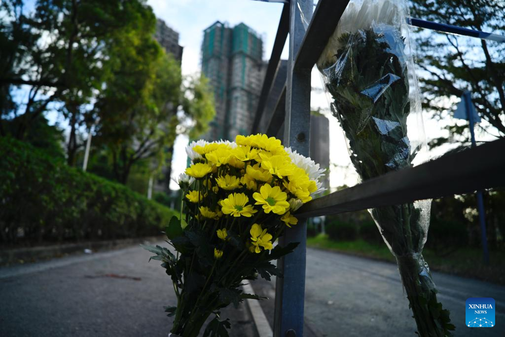 7 people, 2 companies charged over deadly Hong Kong residential building fire