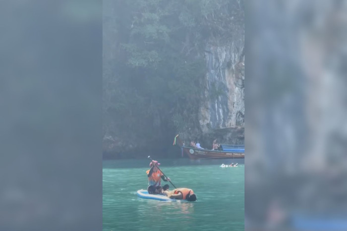 Bangkok Post – Boat captain’s makeshift fish‑viewing technique for reluctant tourist