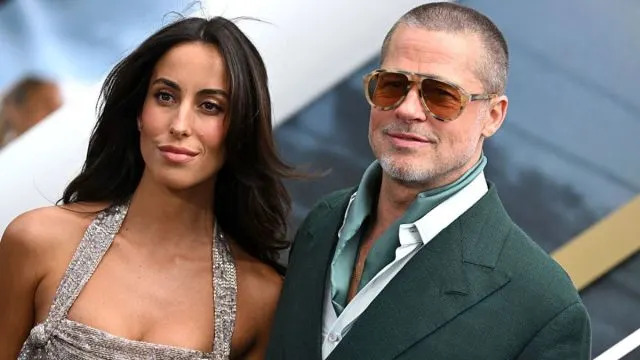 Brad Pitt’s Girlfriend Draws Eyes in Leather Coat With Daring Slit