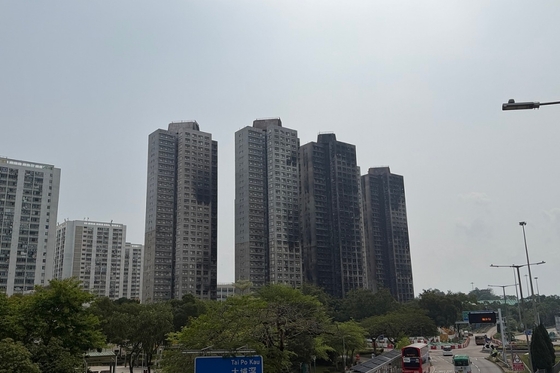 Hong Kong Fire Inquiry Blames Contractor Negligence, Regulatory Failures for 168 Deaths