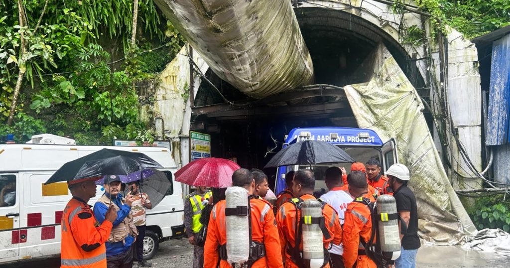 India tunnel collapse kills 22, with others trapped as toxic gases hamper rescue