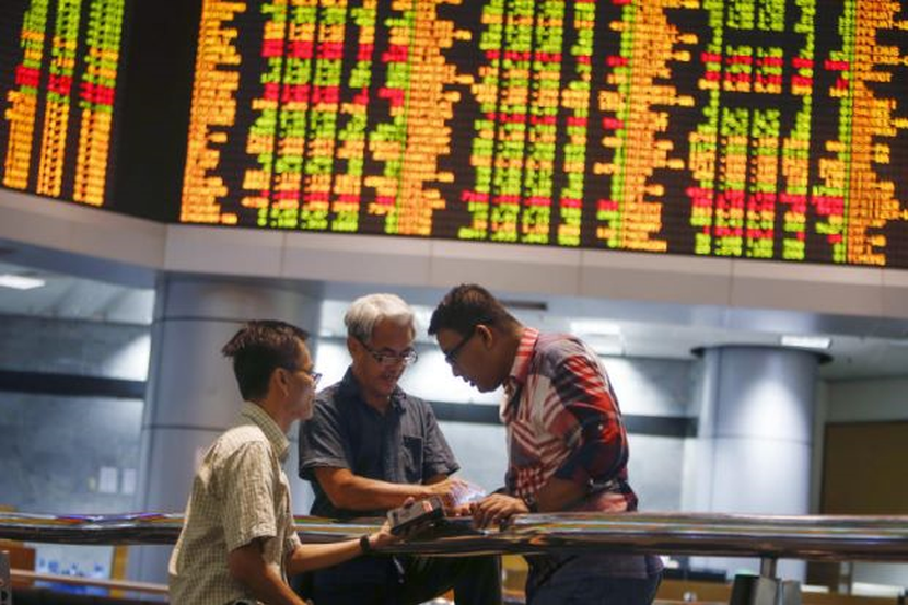 Bursa Malaysia closes slightly lower