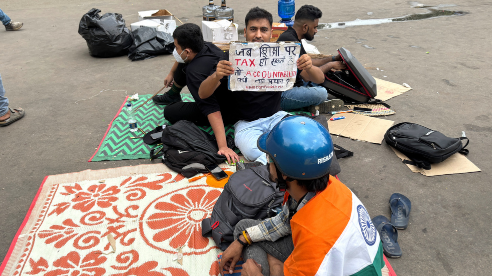India’s education minister resigns amid protests
