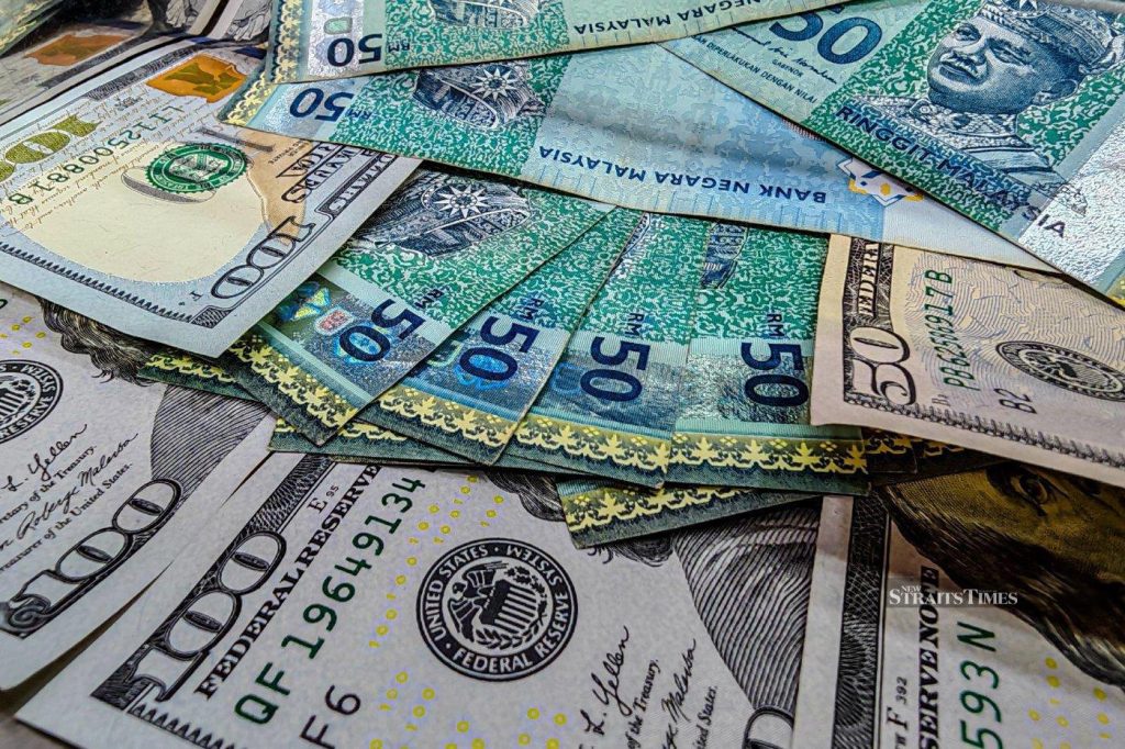 Ringgit opens higher against greenback ahead of Negri Sembilan polls